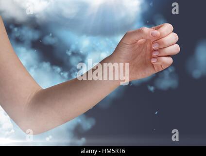 Digitally generated image of hand againt cloud Stock Photo