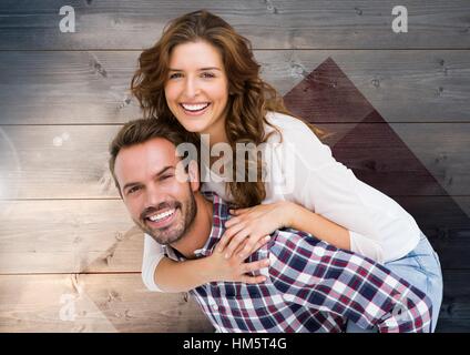 Man giving woman piggyback Stock Photo