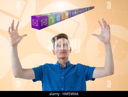 Man pretending to hold digitally generated application icons interface Stock Photo