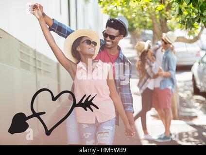 Happy couple dancing on street Stock Photo