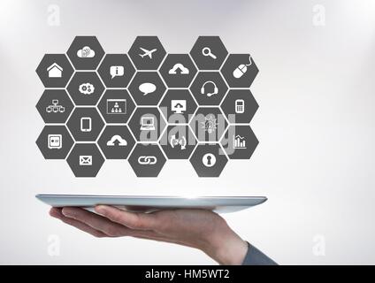 Mans hand using digital tablet with application icon Stock Photo