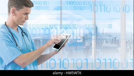Doctor with stethoscope using digital tablet Stock Photo