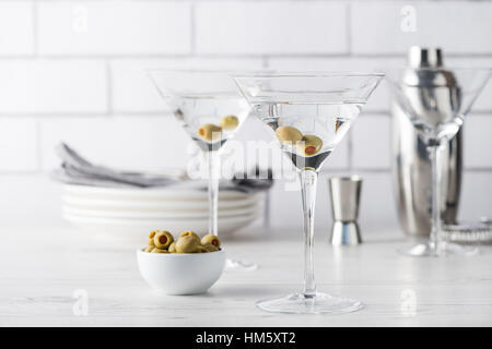 Fresh home made vodka martini cocktails with olives Stock Photo