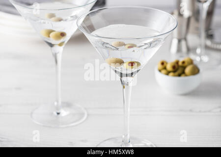 Fresh home made vodka martini cocktails with olives Stock Photo