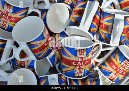 Tourist souvenir mugs bearing the Union Jack British flag and the slogan ’Keep Calm and Carry On’, London, UK Stock Photo