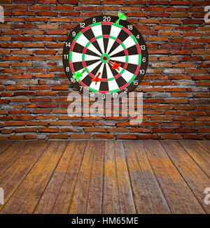 Dartboard on brick wall (Darts Hit Target) Stock Photo
