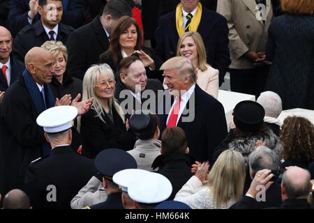 President-elect Donald Trump greets American casino magnate Sheldon Adelson as he arrives for the Inaugural Ceremony to become the 45th President on Capitol Hill January 20, 2017 in Washington, DC. Stock Photo