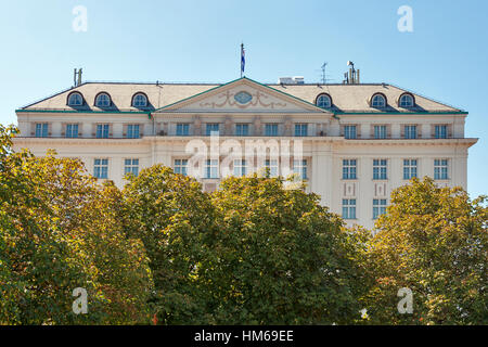 ZAGREB, CROATIA - AUGUST 21: Building of The Regent Esplanade Hotel peek through the trees in Zagreb, Croatia on August 21, 2012. It was built in 1925 Stock Photo