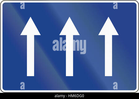 Road sign used in Spain - Three lanes one-way road. Stock Photo