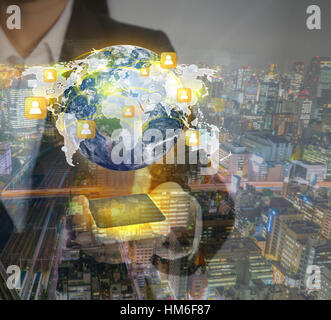 Double exposure of Hand holding a phone show Earth and social network (Elements of this image furnished by NASA) Stock Photo