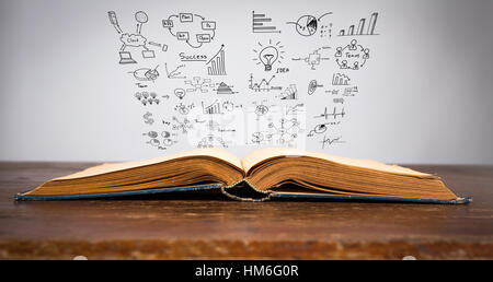 Magic book with business concept and graph Stock Photo