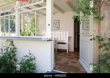 Holiday apartment, view into glazed veranda from the outside, the island of Rügen, Stock Photo