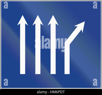 Road sign used in Spain - Fork right on four-lane road. Stock Photo