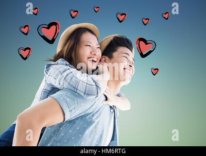 Happy man giving piggy back to woman Stock Photo