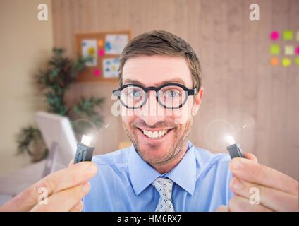 Portrait of nerd man holding cables with flare Stock Photo