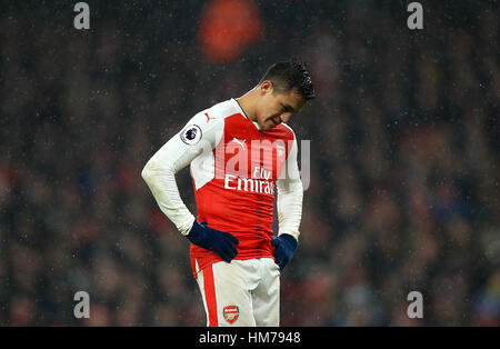 Arsenal's Alexis Sanchez looks dejected during the Premier League match at The Emirates Stadium, London. Stock Photo