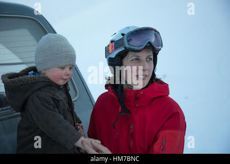 Mother and young son enjoying Mount Olympus ski resort in Canterbury, New Zealand Stock Photo