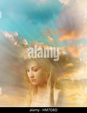 Face of young woman with sunrays and cloudy sky in background Stock Photo
