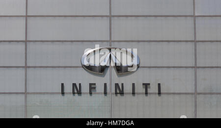 KIEV, UKRAINE - AUGUST 31, 2015: Infiniti logo on facade of auto trade salon Auto-Activ company, the official dealer in Ukraine. Biggest in Europe it  Stock Photo