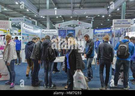 KIEV, UKRAINE - OCTOBER 11, 2015: People visit Panasonic, Japan electronics manufacturer company booth during CEE 2015, the largest electronics trade  Stock Photo