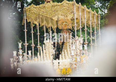 Virgin Mary on palm sunday (easter week). Heavy figure that is moved by manpower during a procession. Typical of Easter, Holy Week in Spain. Stock Photo