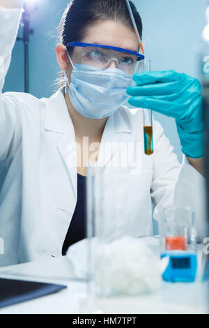 Young woman carries out tests Stock Photo
