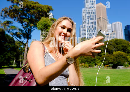 Young woman talking on smartphone Stock Photo