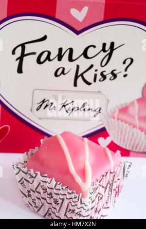 Packet of Fancy a Kiss Fondest Fancies cakes by Mr Kipling just in time for Valentines day with cake removed placed in front of box Stock Photo