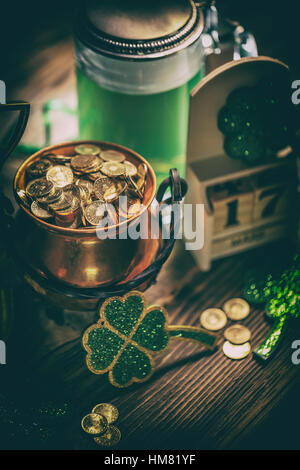 Block calendar for St Patrick's Day, March 17, with green beer and pot of gold Stock Photo