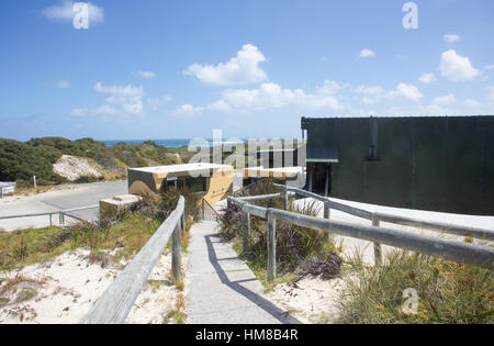 Footpath through Oliver Hill Battery with military buildings and ocean views at Rottnest Island in Western Australia. Stock Photo