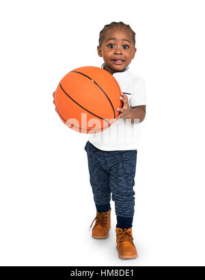 Little Kid With Basketball Concept Stock Photo