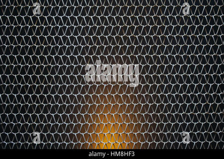 Diagonal Metallic mesh grid net fence texture background Stock Photo