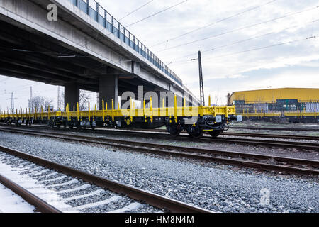 Burgas, Bulgaria - January 27, 2017 - Freight cargo train - 4-axled flat wagon Type:Res Model:072-2 - Transvagon AD Stock Photo