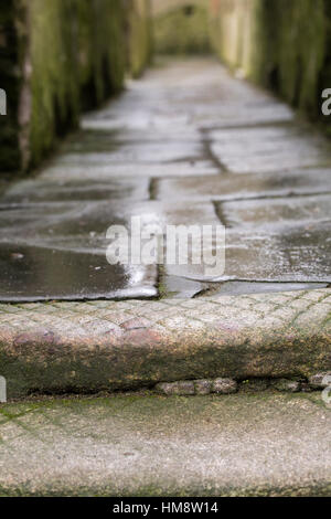 Wet flagstone path in Charlesfort castle, Kinsale, Cork, Ireland