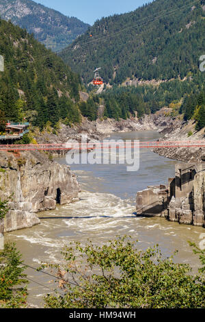 Hell's Gate and Fraser River in British Columbia, Canada. The Air Tram and pedestrian suspension bridge. Stock Photo