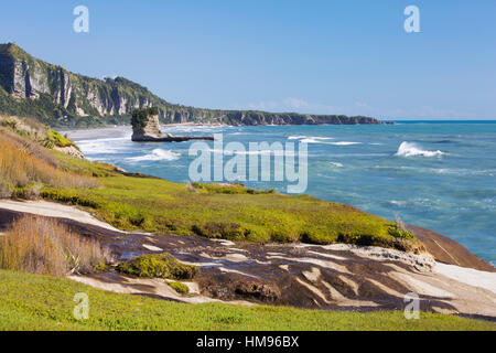 View along the Tasman Sea coast to Dolomite Point, Punakaiki, Paparoa National Park, Buller district, West Coast, New Zealand Stock Photo