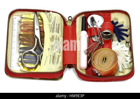 old travel sewing kit isolated on white background Stock Photo