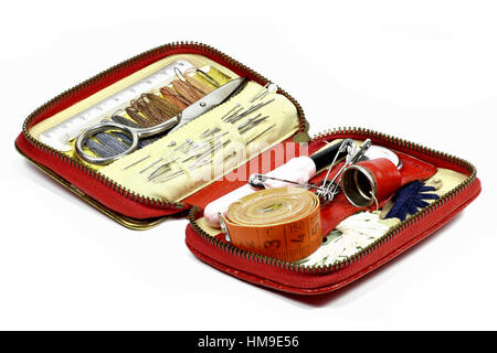 old travel sewing kit isolated on white background Stock Photo