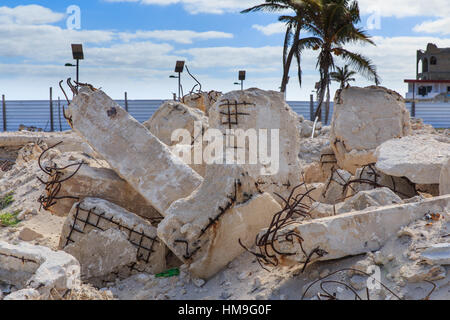 Building Rubble Concrete and Rebar,the ruins of a building after it was demolished. Stock Photo