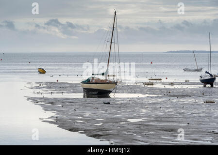 Beached boats at low tide at Leigh on Sea Stock Photo