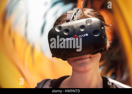 The world of the Virtual Reality - 3D Gaming with a VR gaming headset Stock Photo