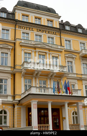 FRANTISKOVY LAZNE, CZECH REPUBLIC - NOVEMBER 15: Hotel Imperial building facade with set of flags in famous spa thermal resort on November 15, 2012 in Stock Photo