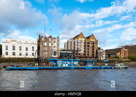 WAPPING, LONDON, UK - 18OCT2016: Wapping Police Pontoon and Station is the HQ and operating base of the Metropolitan Police Marine Policing Unit cover Stock Photo