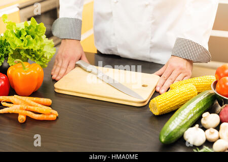 chef is ready to work in kitchen Stock Photo