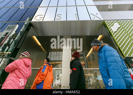 Tokyo, Japan. 2nd February 2017. Pedestrians walk past the new commercial complex Ginza Six on February 2, 2017, Tokyo, Japan. Ginza Six is set to be Ginza's biggest commercial complex built on the land formerly occupied by the Matsuzakaya Department Store on Chuo-dori (the main shopping street) in Ginza. The new building incorporates luxury international brands stores like Celine, Dior and Fendi, boutiques and a restaurants area. The complex will open to shoppers on April 20, 2017. Credit: Rodrigo Reyes Marin/AFLO/Alamy Live News Stock Photo