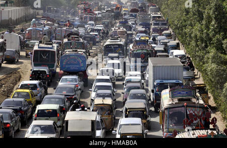 Huge numbers of motors stuck in traffic jam due to one-way road while development works at University Road in Karachi on Thursday, February 02, 2017. Stock Photo