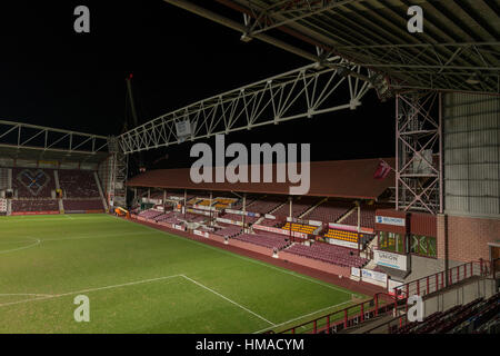 Edinburgh, UK. 2nd Feb 2017. Heart of Midlothian FC's redevelopment of Tynecastle Stadium completes the installation stage of a 104 ton steel structure over the existing main stand. This will allow the new stand to be built over the existing stand, which will remain in use until the end of season 2016/17. The new stand will be completed in September 2017 increasing ground capacity by over 3,500. Credit: Alan Paterson/Alamy Live News Stock Photo