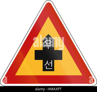 Korea Traffic Safety Sign with the word Stop in English and Korean