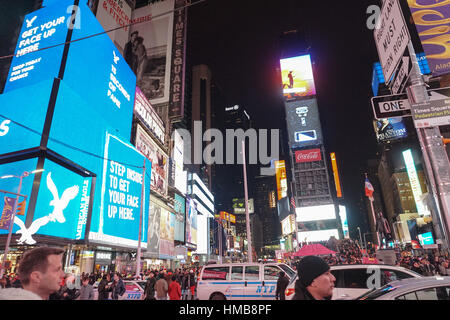 Times Square at night at Christmas, New York City Stock Photo