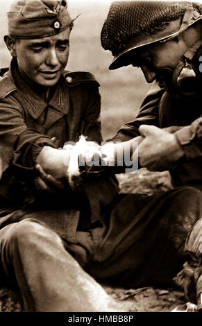 WORLD WAR II: MEDIC, 1944. /nA wounded American soldier treated by a ...